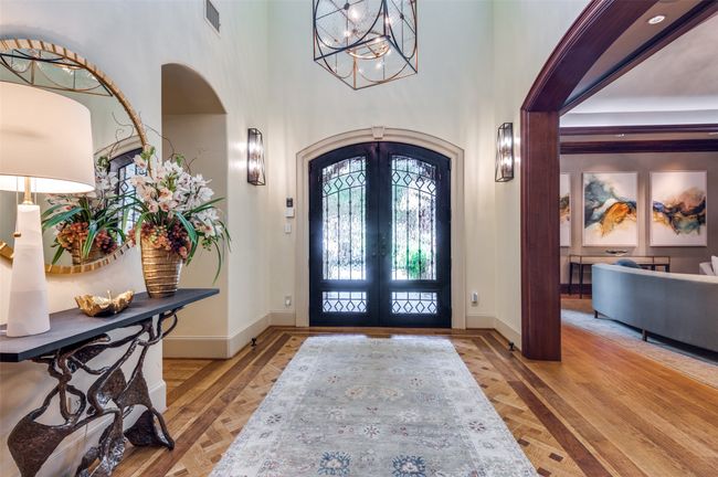 Double iron and glass doors open to the Entry Hall | Image 8