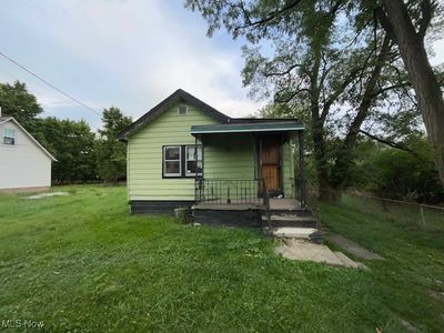 View of front of home with a front lawn | Image 1