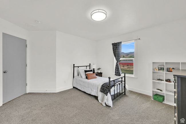 Bedroom with carpet | Image 40