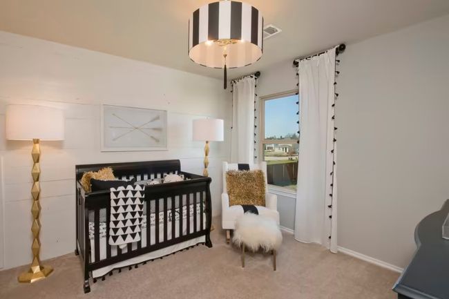 Photo of Pulte model home with same floor plan, not of actual home listed. | Image 13