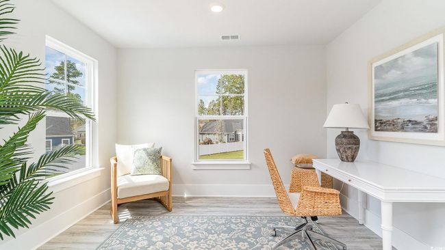 Office featuring plenty of natural light, light wood-type flooring, and baseboards | Image 19