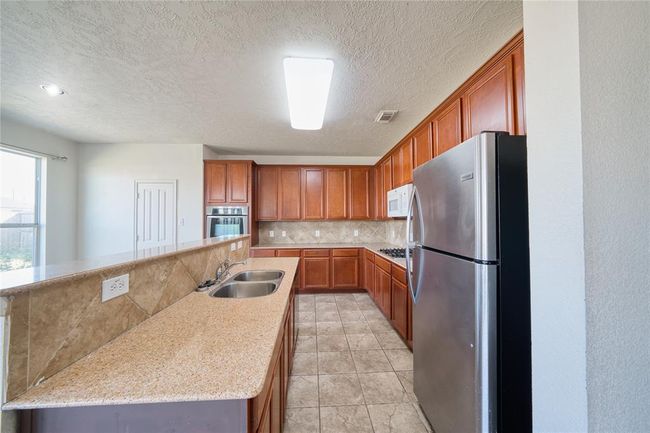 6610 Autumn Sunset Ln, House other with 4 bedrooms, 4 bathrooms and 2 parking in Spring TX | Image 11