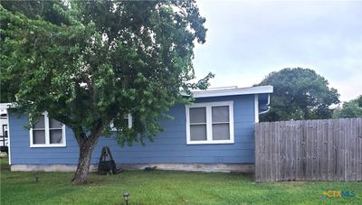 West side showing privacy fence. | Image 3