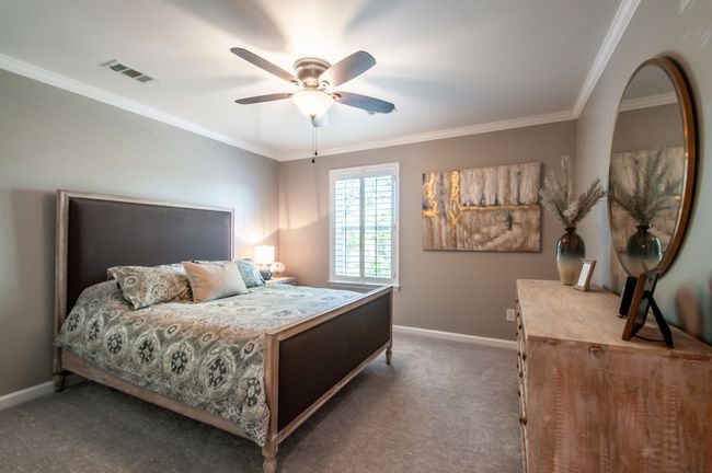 Bedroom 2 has a newer contemporary carpet, a ceiling fan and a large double closet. | Image 35