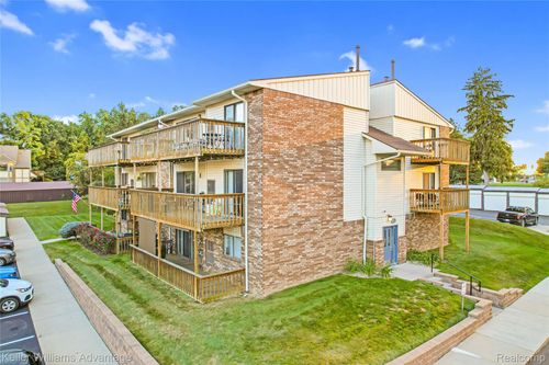 a205-855 S Pontiac Trl, Walled Lake, MI, 48390-3301 | Card Image