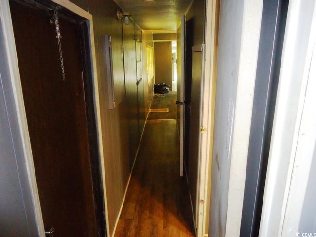 Corridor with wood finished floors | Image 10