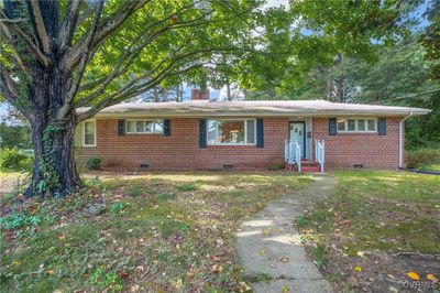 View of ranch-style house | Image 1