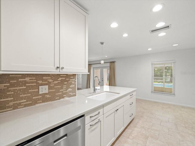 4016 Windtree Dr, House other with 4 bedrooms, 2 bathrooms and null parking in Tampa FL | Image 8