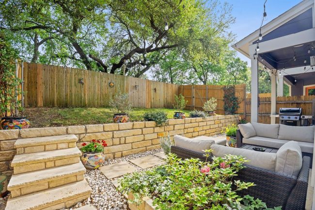 Terraced limestone patio with stairs and retaining wall | Image 28