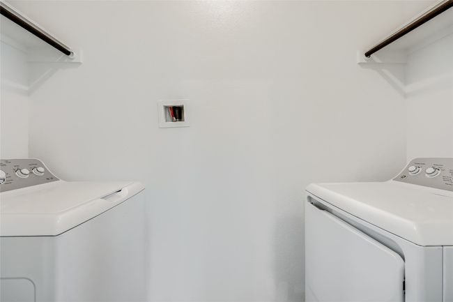 Laundry area with washing machine and dryer | Image 15