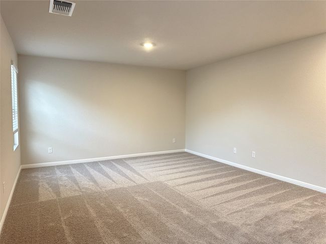 Carpeted bonus room with baseboards | Image 14
