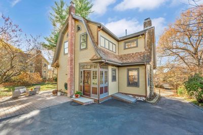 The beautiful 1918 architecture of this home is one of its many unique features. | Image 2