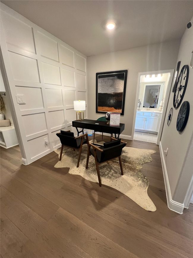 Office with dark wood-style floors and baseboards | Image 9