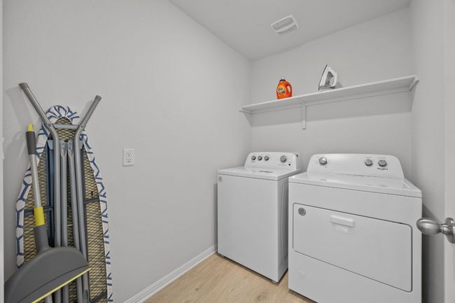 Laundry room features both electric and gas hook-ups | Image 30