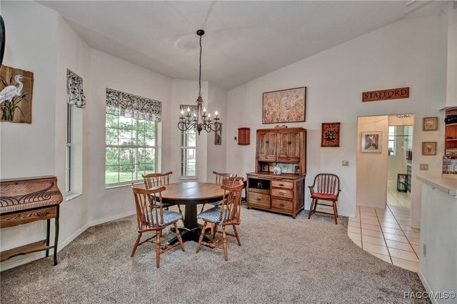 Dining area with pretty view | Image 12