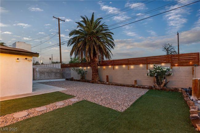 View of yard with a fenced backyard | Image 45