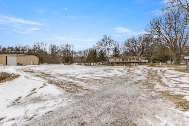 House is close proximity to outbuildings | Image 49