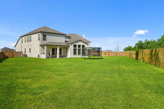 Expansive backyard with plenty of room to play, entertain, or build your dream pool. | Image 41