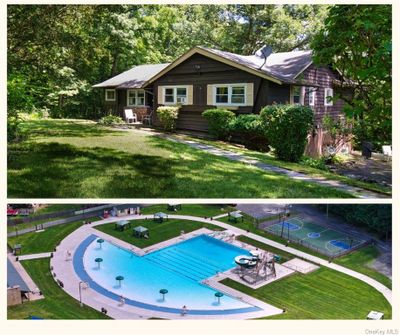 View of swimming pool with a yard and a patio area | Image 1