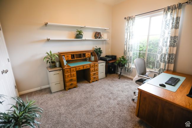 Home office with carpet floors and baseboards | Image 18