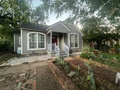 Bungalow-style home with a porch | Image 1