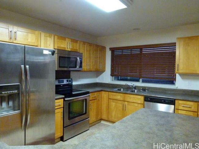 803 - 91-1249 Kamaaha Avenue, Home with 3 bedrooms, 2 bathrooms and 2 parking in Kapolei HI | Image 1