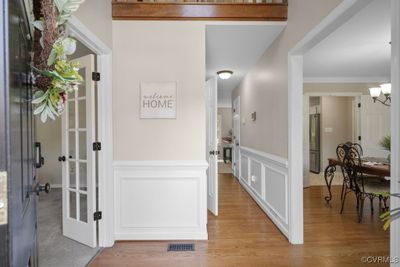 Hallway featuring light hardwood / wood-style flooring, and fixture | Image 2