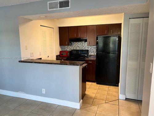 2003-1261 Sw 46th Ave, Pompano Beach, FL, 33069-0957 | Card Image