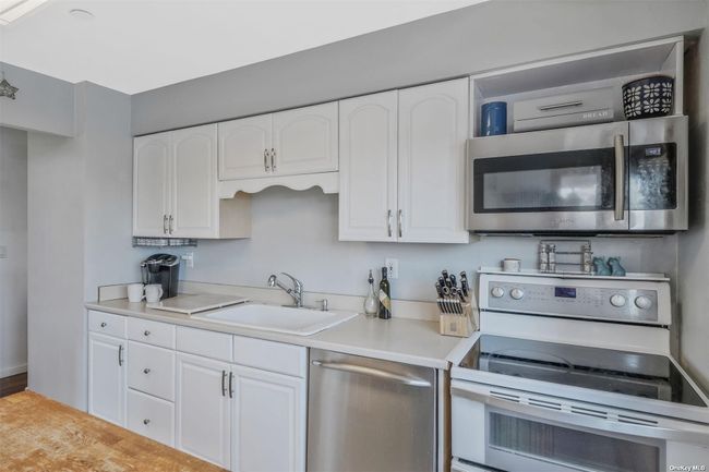 Charming Kitchen View w/Updated Energy-Saving Appliances | Image 9