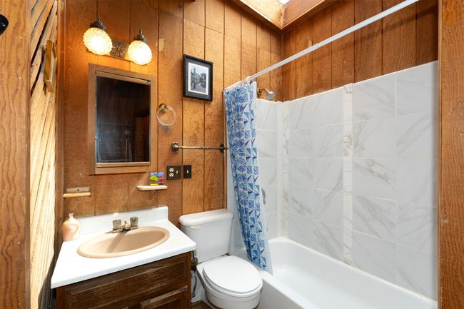 Main level bedroom with laundry and full bathroom | Image 34