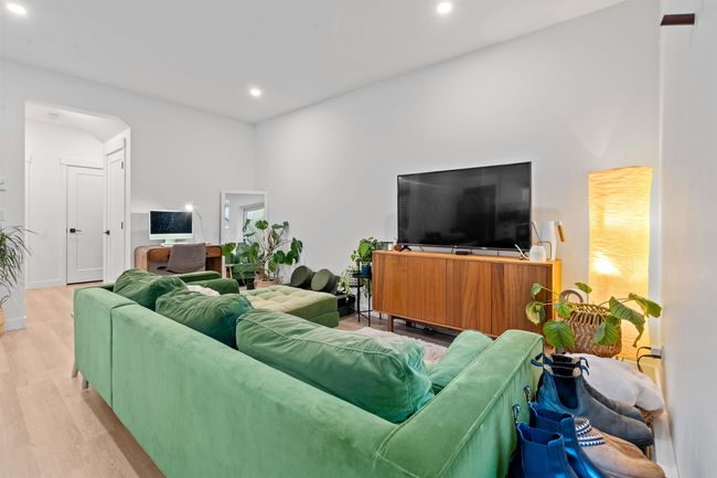 Living room featuring recessed lighting, baseboards, and wood finished floors | Image 33