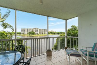 406 - 3051 N Course Dr, Condo with 3 bedrooms, 2 bathrooms and null parking in Pompano Beach FL | Image 1