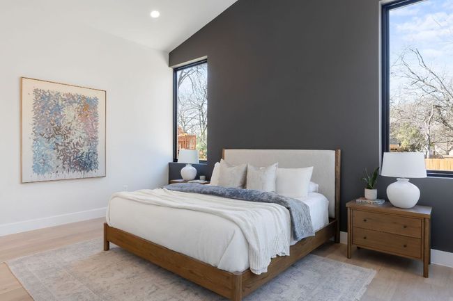 Bedroom featuring recessed lighting, baseboards, lofted ceiling, and wood finished floors | Image 23
