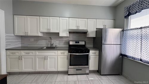 8730 79th Ave, Glendale, NY, 11385-7650 | Card Image