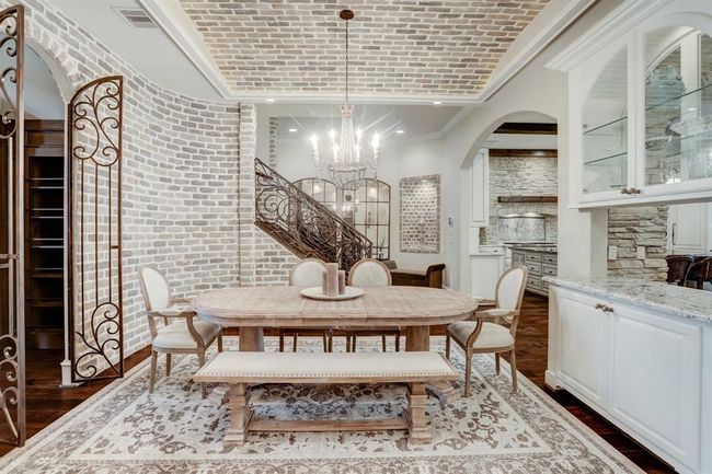 Plenty of serving space with an entry to the wine room. | Image 5