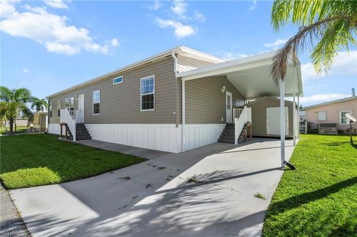 24 Red Poinciana Dr, FORT MYERS, FL, 33908-1820 | Card Image