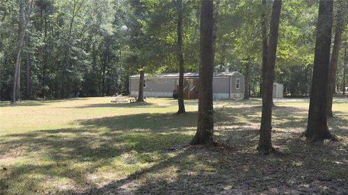 51 Wood Forest Dr, New Waverly, TX, 77358-4424 | Card Image