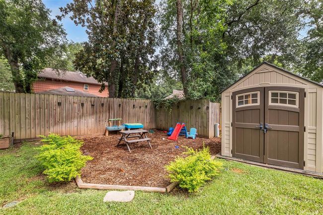 The Tuff Shed provides great storage space, and the seller also added a designated play area for the kids. | Image 37