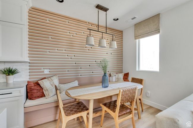 Dining space featuring light wood-style flooring and breakfast area | Image 28