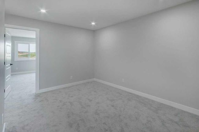 82 Edith Green Nw, Home with 4 bedrooms, 3 bathrooms and 2 parking in Calgary AB | Image 12