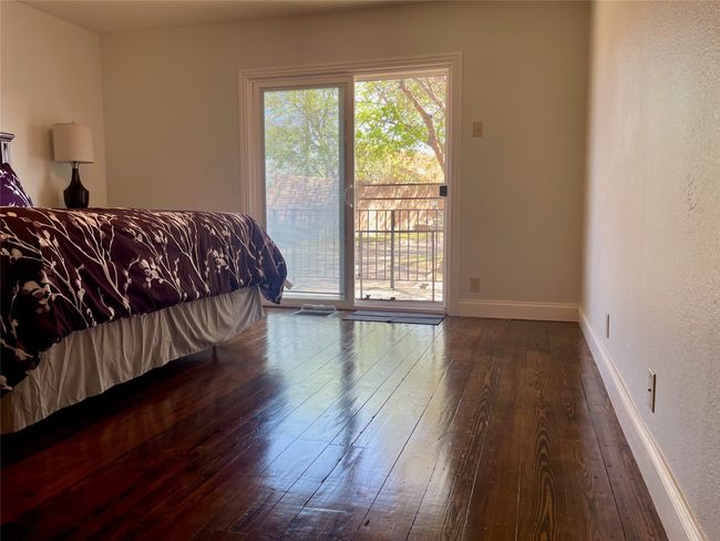 Plenty of room to add a sitting area or office set up in this bedroom. | Image 23