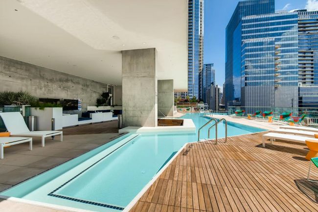 Community pool featuring a patio area | Image 28
