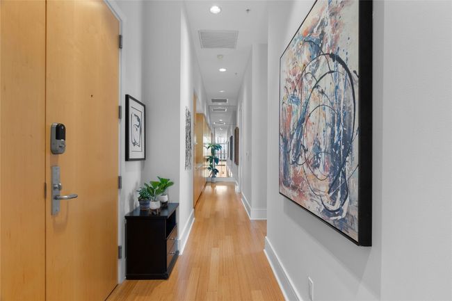 The long corridor leading to bedrooms | Image 22