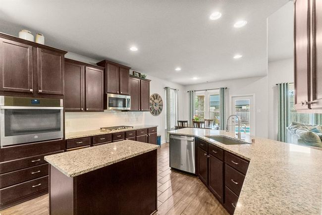 Plenty of cabinet space for storage! | Image 13