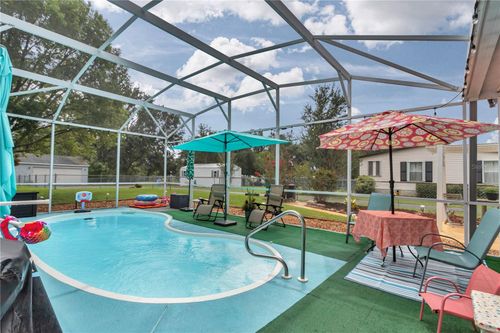7823 County Road 109, LADY LAKE, FL, 32159-8806 | Card Image