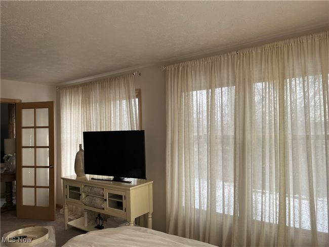 Sunroom used as the second Bedroom on the First Floor. | Image 26