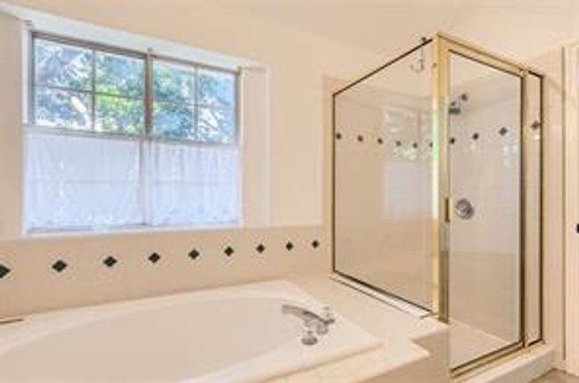 Full bath with a garden tub and a shower stall | Image 15