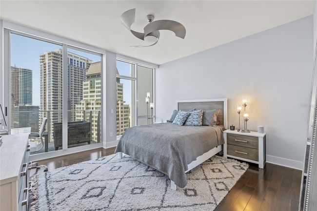 Master Bedroom with more city views and privacy remote shades | Image 37