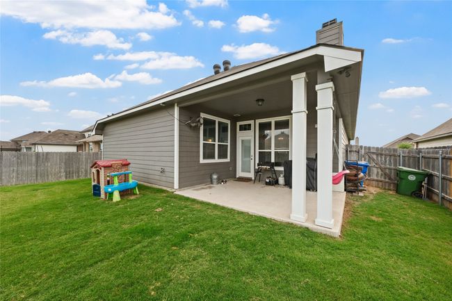 Back of house featuring a patio area and a chimney | Image 25