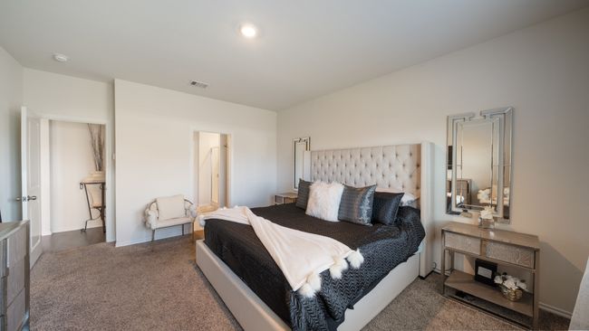 Carpeted bedroom featuring baseboards | Image 15